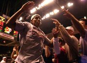 Maryland's Lonny Baxter is congratulated by fans. Baxter helped the
Terps pound Stanford, 87-73, on Saturday in Anaheim, Calif.