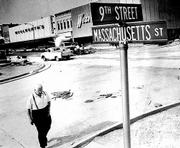 Lawrence&squot;s historic thoroughfare Massachusetts Street, shown here
in the 1970s has served as the city&squot;s "Main Street" since the
town&squot;s founding in 1854. That year, settlers arrived and christened
the city "Lawrence" to honor Amos Lawrence, a Free-Stater and major
supporter of the New England Emigrant Aid Society which had
sponsored the migration to Kansas.