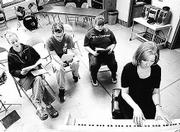 Morland High School students sing during vocal music class while
their instructor, Becky Ellis, plays the piano in late March at
Morland. The school, with 19 students, will close at the end of the
school year due to low enrollment.