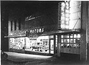 Signs gleaming downtown at night, Gallagher Motors circa 1950
advertises one of its new displays the DeSoto. The dealership,
owned by the late Buddy Gallagher, was located at 634 Mass., where
Kring's Interiors is today.