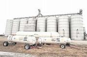 The Farmers Cooperative Assn.'s Midland Elevator north of Lawrence
is included in a possible purchase deal. FCA, the state's largest
agricultural cooperative, has been mired in uncertainty since
September, when it filed for bankruptcy protection.
