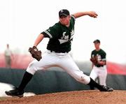 Free State High pitcher Eric Peterson delivers. Peterson left with
no decision in the first game of the Firebirds' doubleheader split
with Olathe East on Thursday at FSHS.
