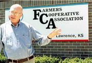 The Farmers Cooperative Assn. plans to auction its assets to settle
last fall's bankruptcy filing. Don Dumler, the co-op's president
and CEO, discusses the auction plans Wednesday at the Lawrence
headquarters at 2121 Moodie Road.