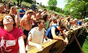 Concertgoers listen to Pomeroy during Day on the Hill on Kansas
University's campus. Saturday's music festival drew an estimated
3,000 people.