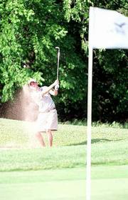 FREE STATE'S Charlie Santaularia hits out of the sand on hole No.
10 during a five-hole playoff for third place. Santaularia won the
playoff and resultant berth to state on Monday at Eagle Bend.