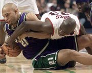 Milwaukee's Ray Allen, left, drives past Philadelphia's Allen
Iverson. Allen scored 38 points to lead the Bucks past the 76ers,
92-78, Thursday night in Philadelphia.