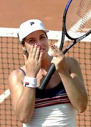 Jennifer Capriati blows a kiss to spectators. Capriati ousted
Serena Williams, 6-2, 5-7, 6-2, in the French Open quarterfinals on
Tuesday in Paris.