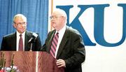 The Hall Family Foundation of Kansas City, Mo., is presenting
Kansas University the largest gift in the history of Kansas higher
education. Donald J. Hall, chairman of the Hall Family Foundation
and Hallmark Cards Inc., left, listens as KU Chancellor Robert
Hemenway announces the gift of $42 million dollars Tuesday
afternoon at the KU Medical Center School of Nursing Atrium.