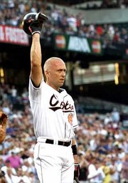 Baltimore's Cal Ripken Jr. acknowledges the crowd. Ripken was
cheered Tuesday during a game against Toronto at Camden Yards.