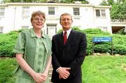 The Hall center for the humanities will receive $7 million of the
$42 million gift to Kansas University announced Tuesday by the Hall
Family Foundation. Janet Crowe, executive director, and Victor
Bailey, director, stand outside the Hall Center's headquarters,
Watkins Home, a 1937 building that may be remodeled with part of
the money.