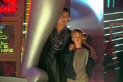 Haley Joel Osment, right, portrays an artificially created boy who
runs away, aided by a fellow fugitive robot (Jude Law), believing
he can find a method that will transform him into a human.