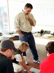 Marty Tuley, owner of Total Fitness Athletic Center, is mulling a
business move to Plaza Six Theaters, 2339 Iowa.
