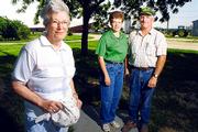 Fifty years after a torrent of water overcame their family farm,
Pauline Nunemaker, her daughter, Mary Ross, (who was an infant
during the flood), and her son-in-law, Pat, have returned the land
to its former glory. For photos of their experiences during the
flood, see page 6.