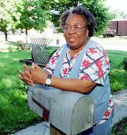 Alice Fowler, Lawrence, was a little girl during the Flood of 1951.
She remembers her mother coming out and telling her to get out of
the water she was wading in.