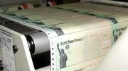 Blank tax rebate checks enter a laser printer at the Treasury
Department's Financial Management Service plant in Kansas City, Mo.
An estimated 692,000 rebate checks were ready to be mailed Friday
from this plant.