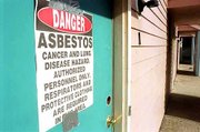 Asbestos removal from apartments at 1301 Ohio and 1307 Ohio, slated
for demolition by Kansas University, has begun in the Oread
neighborhood. Four old houses on Ohio near the apartment complex
also are planned for demolition by KU, a move that is upsetting
some Oread neighbors.