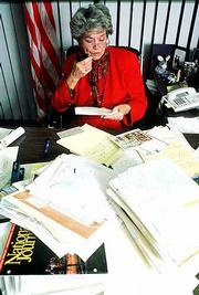 Former Kansas Gov. Joan Finney dictates responses to letters of
congratulations on her gubernatorial victory in this file photo
from 1990. Mrs. Finney, 76, died Saturday at St. Francis Hospital
and Medical Center in Topeka.