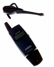 This is the Bluetooth wireless headset, top, with an Ericsson T28
cellular phone with a Bluetooth wireless adapter. As of Nov. 1, New
York becomes the first state to ban holding a cell phone while
driving. With more states considering the ban, headsets become the
only option while behind the wheel.