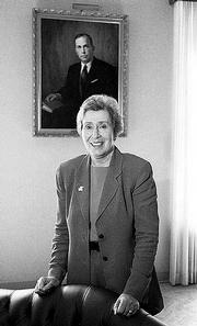 Deborah Powell, executive dean and vice chancellor for clinical
affairs at the Kansas University School of Medicine, says a major
gift from the Hall Family Foundation will continue the school&squot;s
goal of "world-class scientists devoted to building a strong
biomedical research program for the university and the region."
Powell stands in front of a portrait of former KU chancellor
Franklin Murphy.