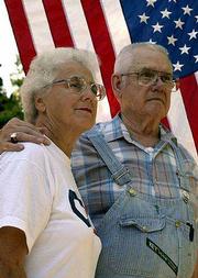Susie and Marvin Rowland, Ottawa, above, lost two close relatives
in the World Trade Center tragedy. Susie Rowland's sister, Mary
Alice Wahlstrom of Kaysville, Utah, and niece Carolyn Beug of Santa
Monica, Calif., were aboard American Airlines Flight 11.
