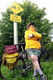 Richard Heckler uses his bicycle as a main source of
transportation. Heckler, who has gathered information on
transportation in Lawrence, will present a community consensus on
traffic, safety and commuter concerns Monday night at the "Lawrence
is Growing" forum at Liberty Hall.