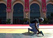 Lee Howard works to remove the red carpet outside the Shrine
Auditorium in Los Angeles after an announcement that the ceremony,
already delayed three weeks by the Sept. 11 terrorist attacks, was
cancelled.