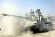 Northern alliance fighters ride atop a tank toward Taliban
positions, north of Kabul, the Afghan capital. Alliance fighters
followed the U.S. strikes on Afghanistan with an offensive of their
own.