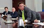 Chris Kattan, left, stars as a veterinarian reluctantly recruited
by his mob family to help outwit the FBI in "Corky Romano."