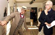 Tim Rues, administrator for Lecompton's Constitution Hall and a
member of the Lecompton Historical Society, left, talks with Kansas
Supreme Court Justice Fred Six, Lawrence, about Samuel Jones, a
town founder who built the hall. The two discussed Lecompton's
history during a tour Thursday by the state's Supreme Court
justices of Lecompton.