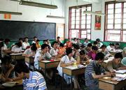 The classrooms at Suzhou Middle School are similar to those in the
United States, except for class size; most have 55 students.
Student desks are lined up in rows facing the front and the
teacher. In the younger grades, boys and girls tend to gravitate to
their own gender as in our classrooms and playgrounds here, an
issue not so important to the older, more serious students.