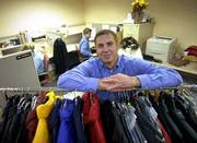 In a time when most online retail companies are going under,
Smartbargains.com has had a significant increase in sales and
business. Carl S. Rosendorf, the company's chief executive officer,
is shown here with some of the site's offerings.