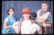 From left, Reyalto (Kathryn Rice), the Emperor (Scott Sedar) and
Simon (Tom Sellwood) interact during a scene from "The Emperor&squot;s
New Clothes," an adaptation by Lawrence playwright Ric Averill that
opens this month at the Kennedy Center for the Performing Arts.