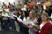 The Lawrence High School A Cappella Choir rehearses for the
upcoming performance of the "Messiah," The concert will be at 3:30
p.m. Nov. 18 at the LHS Auditorium.