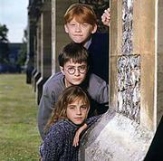 Rupert Grint, top, Daniel Radcliffe and Emma Watson portray the
characters Ron Weasley, Harry Potter and Hermoine Granger in the
film "Harry Potter and the Sorcerer&squot;s Stone."