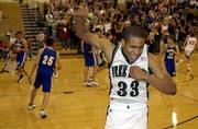 Free State High's Neil Dougherty celebrates in the waning moments.
Dougherty scored a team-high 23 points in the Firebirds' 83-67
victory over Washburn Rural on Friday at FSHS.