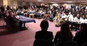 A packed house of media representatives, coaches and athletes
attended Mark Mangino's introductory press conference at Parrott
Athletic Center.
