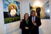 Nobel peace laureate Oscar Arias Sanchez poses with French
photographer Micheline Pelletier during a visit to photo exhibition
at the Norwegian Museum of Cultural History in Oslo. The photo
exhibition is part of the museum's Centennial Exhibition of the
Nobel Prize and shows photos of Peace laureates. Sanchez later
participated in a rally with other laureates calling on Myanmar to
free Aung San Suu Kyi, the 1991 Nobel peace laureate, from house
arrest.