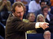 Golden State coach Dave Cowens shouts instructions to his team
during a game last season. The Warriors fired Cowens on Saturday.