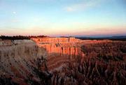Getting up early pays off at Bryce Canyon, as the first light of
dawn illuminates the rugged terrain. Mineral deposits left in the
sandstone and limestone during erosion have left a spectacular
array of pastel colors at this natural beauty in Utah.