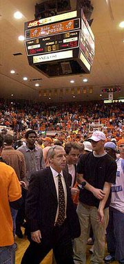 Kansas University Coach Roy Williams walks off the court following
the Jayhawks' 86-53 loss to Oklahoma State two years ago in
Stillwater, Okla. It was the third-worst loss in KU history. The
No. 4 Jayhawks will play the No. 6 Cowboys tonight in Stillwater.