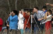 Several dozen people traveled through Clinton Lake State Park and
toured spots frequented by bald eagles. The bird-watching event
Sunday afternoon was part of the 2002 Kaw Valley Eagles Day.