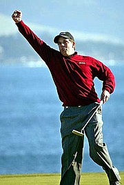 Matt Gogel celebrates his birdie putt on the 18th hole. Gogel shot
a 69 on Sunday at Pebble Beach, Calif., to win the Pebble Beach
National Pro-Am. It was the former Kansas University golfer's first
PGA Tour victory.
