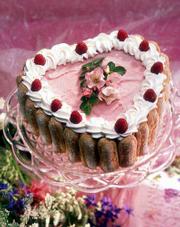 Red Raspberry Ice Cream Cake With Raspberry Amaretto Sauce can be
made up to a month ahead, then kept frozen until you're ready to
serve it to that special someone.