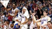 The Ku bench celebrates a late basket. The Jayhawks clinched at
least a share of the Big 12 title with a 102-66 rout of Iowa State
on Monday at Allen Fieldhouse.