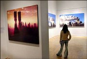 A sunrise picture made in 1973, left, shows an "X-ray view" of the
World Trade Center in a memorial exhibition at the New York
Historical Society. The exhibit also includes photographs of the
towers&squot; final moments on Sept. 11.