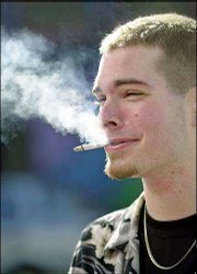 Tony Rinaldi, 19, of San Francisco smokes a cigarette in the Haight
Ashbury area of San Francisco. Members of the California Medical
Assn. propose sponsoring legislation that would raise the state's
smoking age to 21.