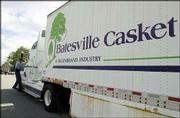 A Georgia State Patrol officer talks to the driver of a Batesville
Casket Co. truck on the road leading to the Tri-State Crematory
outside of Noble, Ga. Officials continue to uncover bodies on the
crematory property.