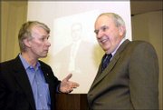Richard J. Roberts, left, who won a Nobel Prize in 1993 for
DNA-related genetic discoveries, talks with Dr. William Jewell,
professor of surgery at the KU Medical Center. The two talked
Friday at the Walter S. Sutton Symposium at the Med Center, where
Roberts spoke.