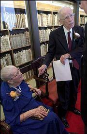 G. Baley Price, 96, retired KU mathematics department chairman, and
his wife, Cora Lee Beers Price, 93, retired KU English and Classics
instructor, are reception honorees at the Spencer Research Library.
The two are giving their faculty papers to the university.