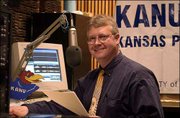 Bryan Thompson, Salina-based children's health reporter for Kansas
Public Radio, produces a syndicated series for KANU and its
affiliates. Thompson was photographed in February in the KANU
studios in Broadcasting Hall at Kansas University.